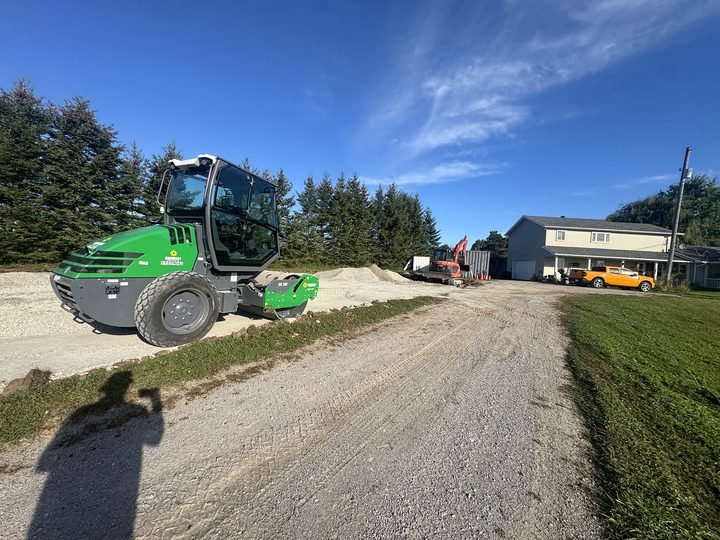 Compacting a gravel surface during site preparation